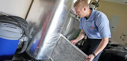 Peterman-Brothers-Hvac-Tech-Changing-A-Furnace-Filter-Landscape (1)