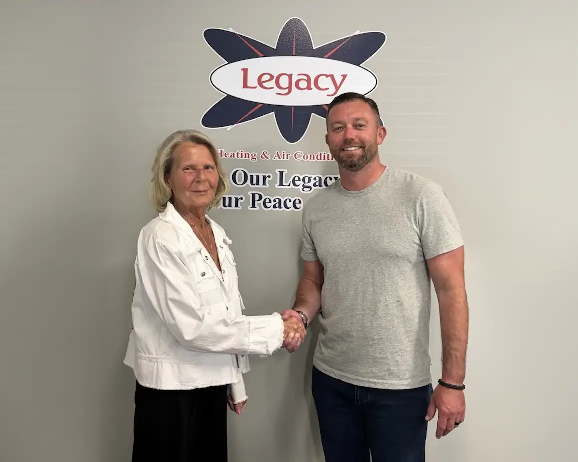 Chad Peterman of Peterman Brothers with Vicky Griffith, Owner of Legacy Heating